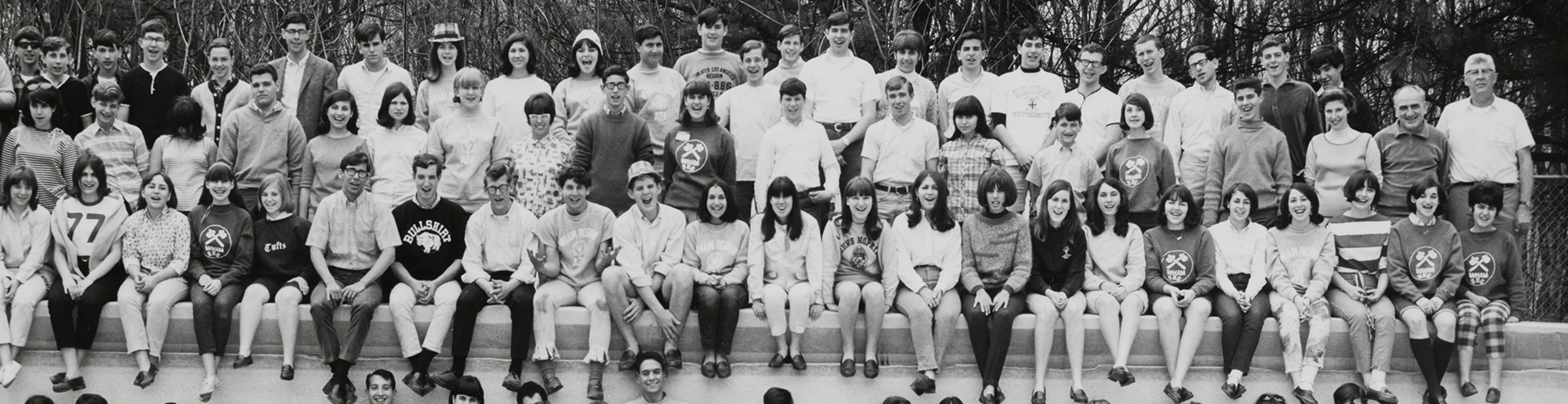 Group of diverse young people smiling at a community event