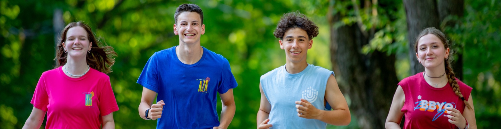 Group of diverse young people smiling at a community event