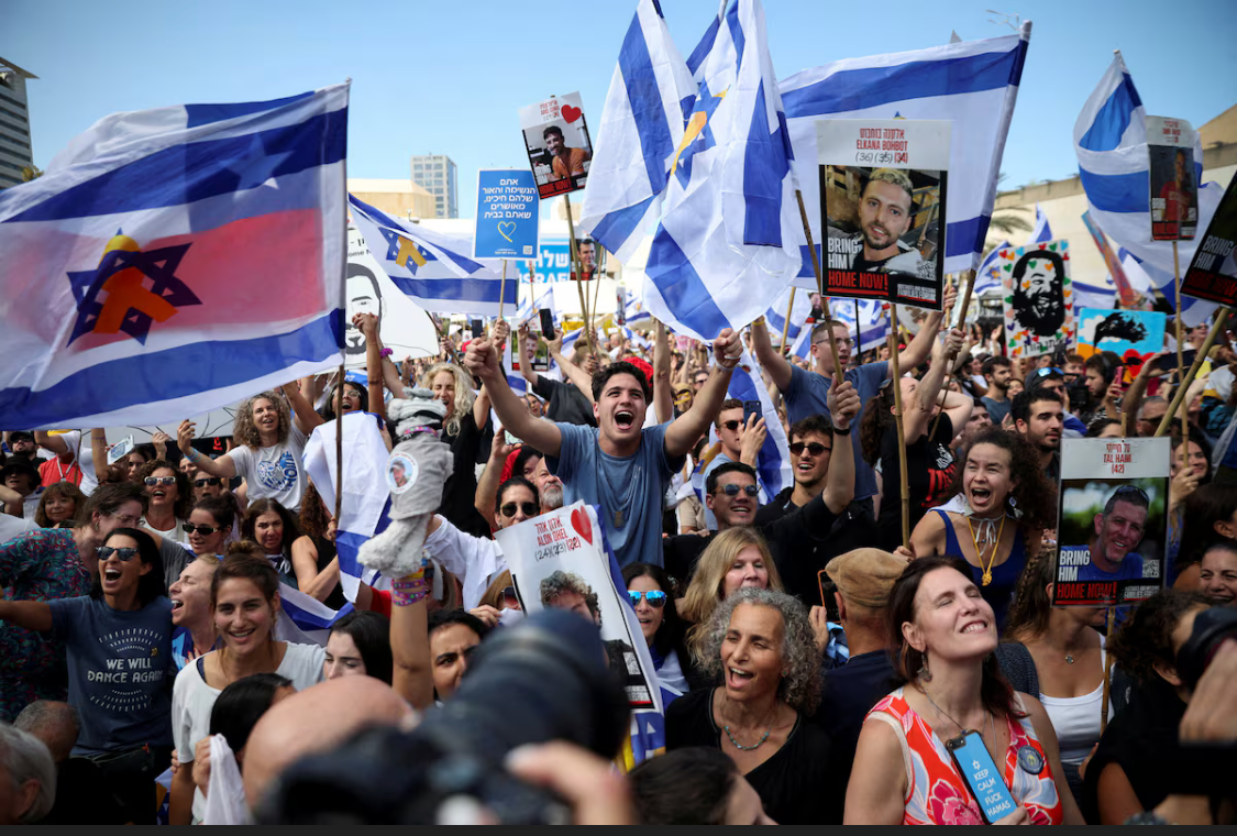 Group of people celebrating on stage