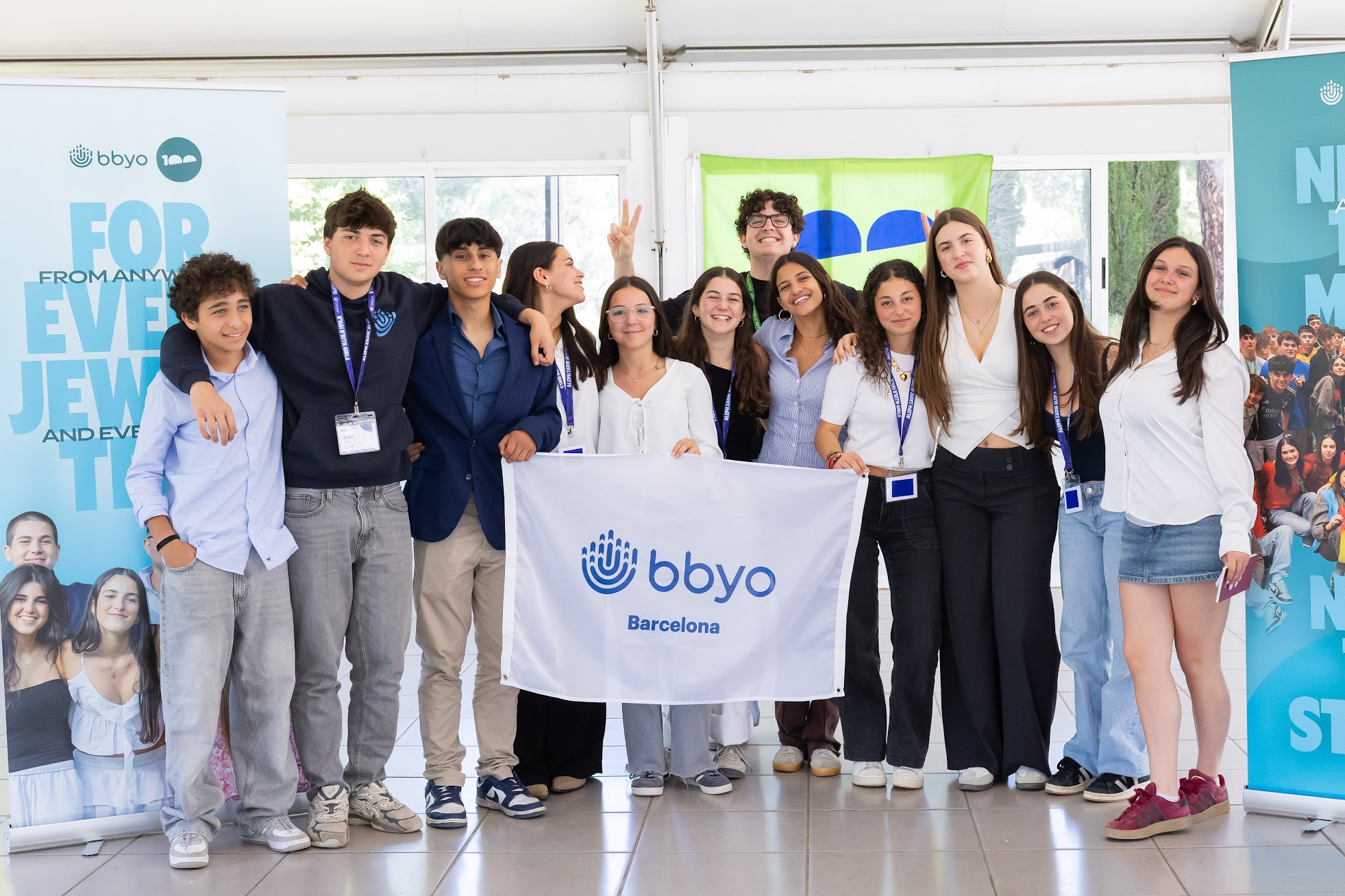 Group of diverse young people smiling at a community event