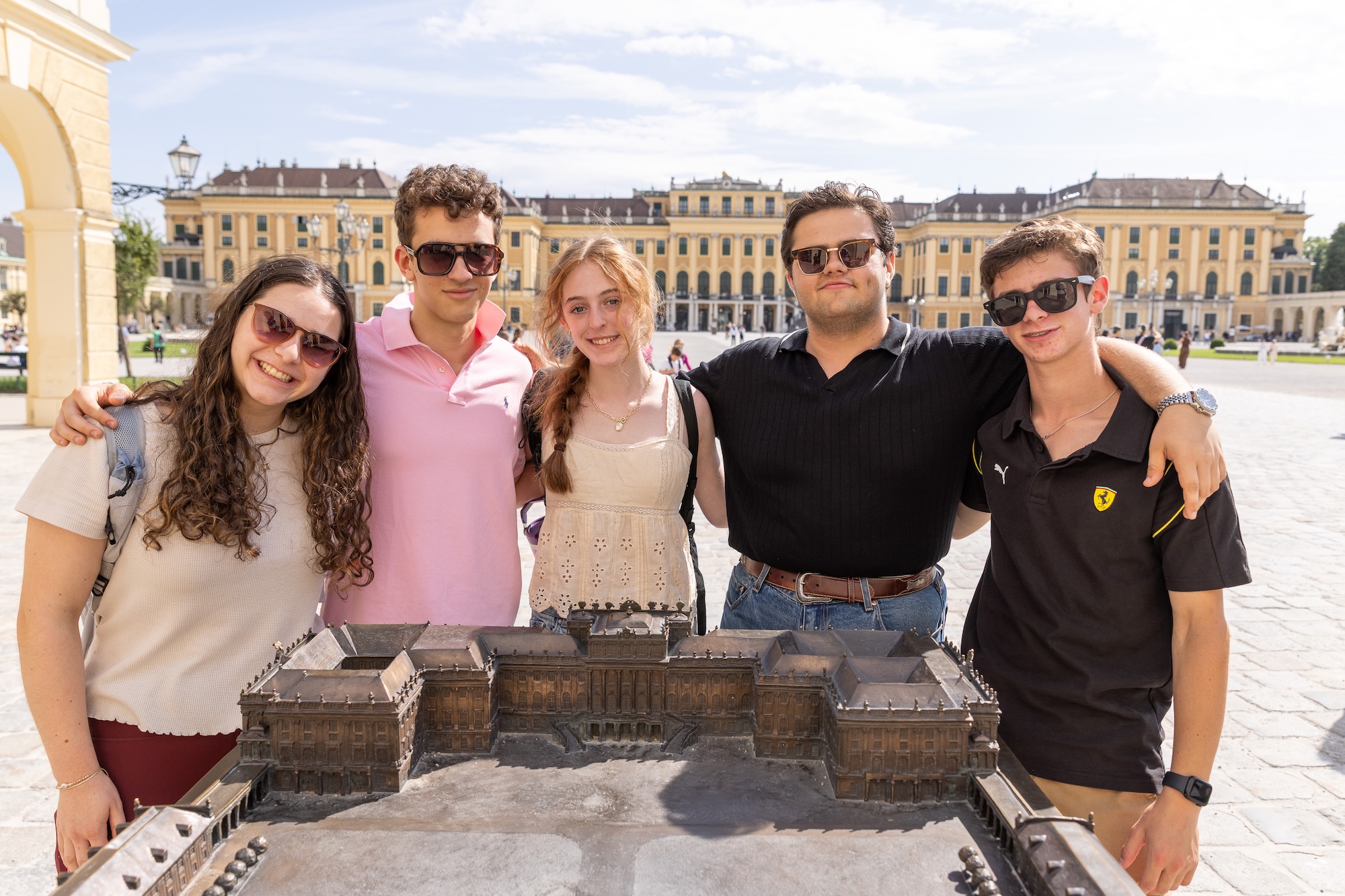 Group of people smiling outdoors