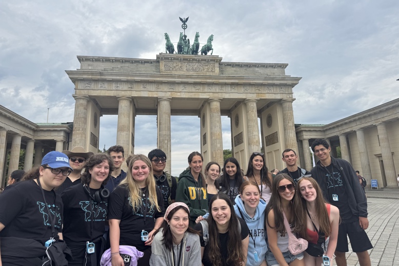 Group of people smiling outdoors