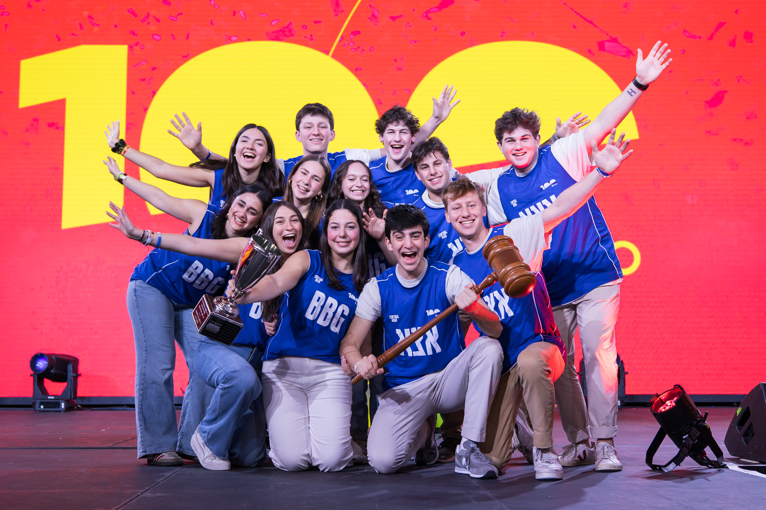 Group of diverse young people smiling at a community event