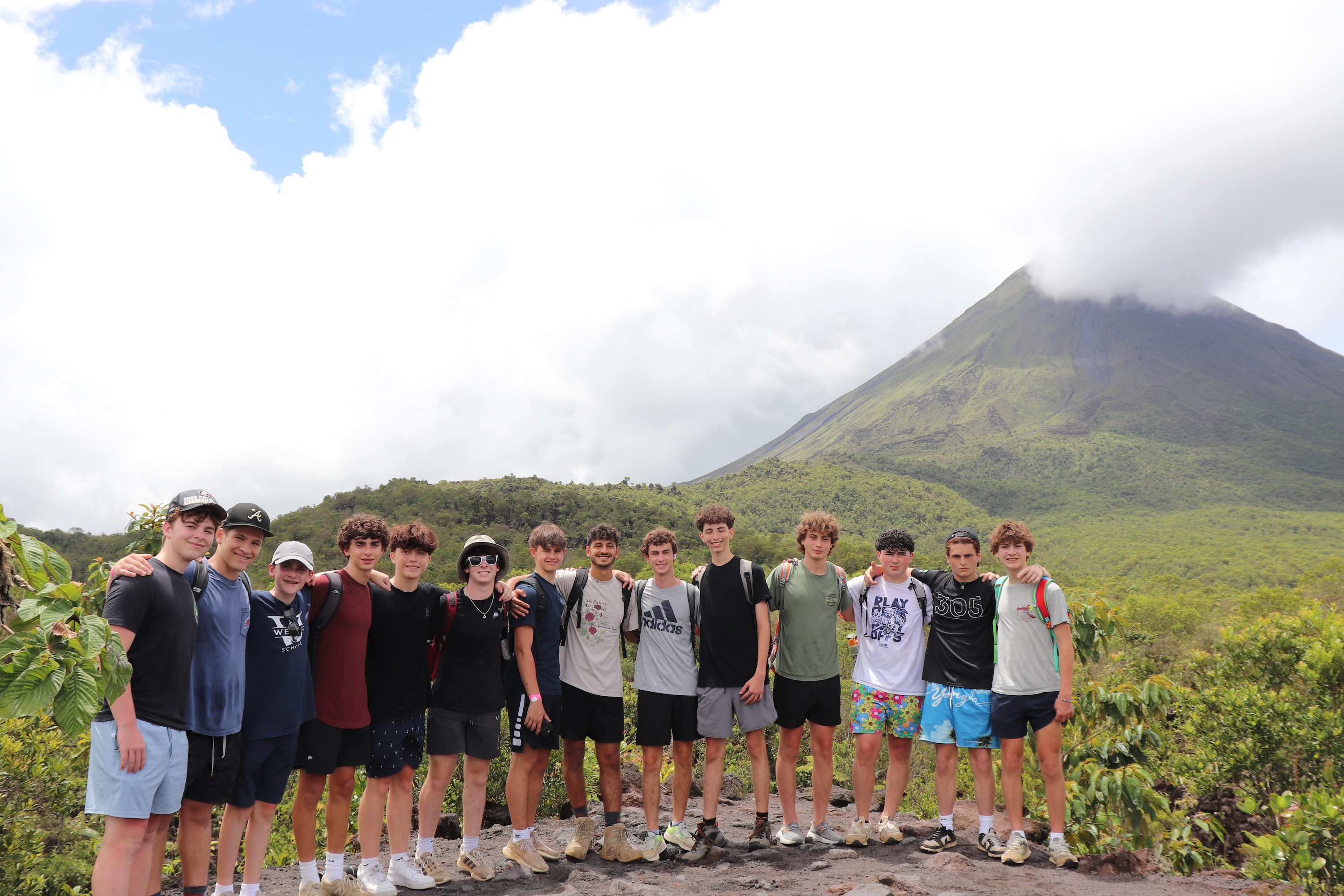 Group of people smiling outdoors