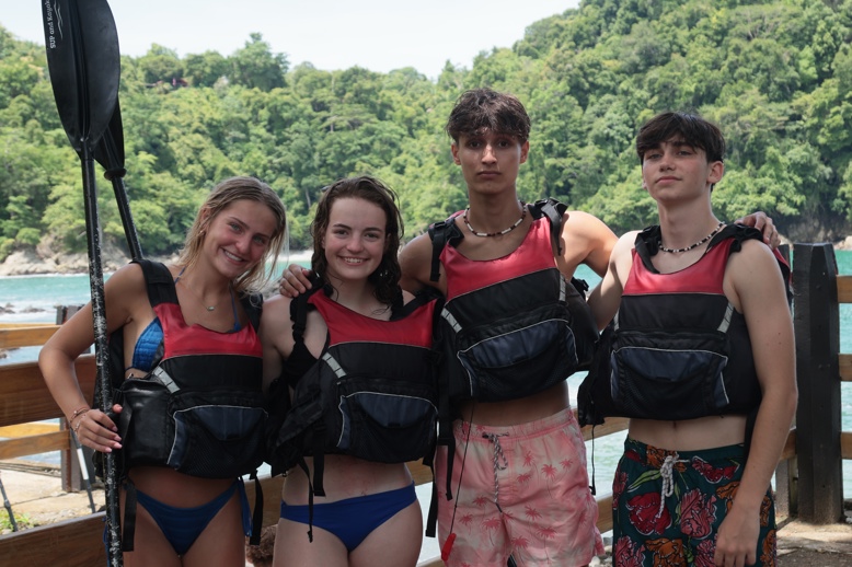 Group of people smiling outdoors
