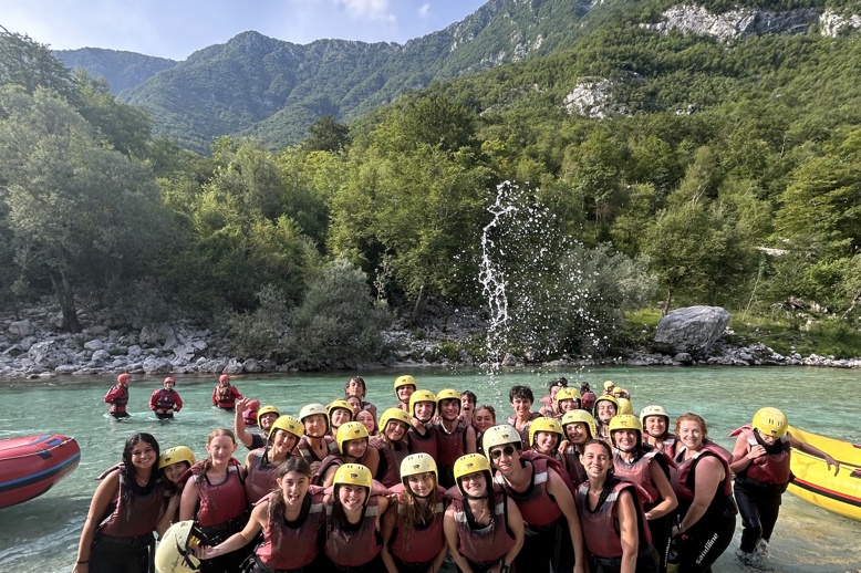 Group of people smiling outdoors
