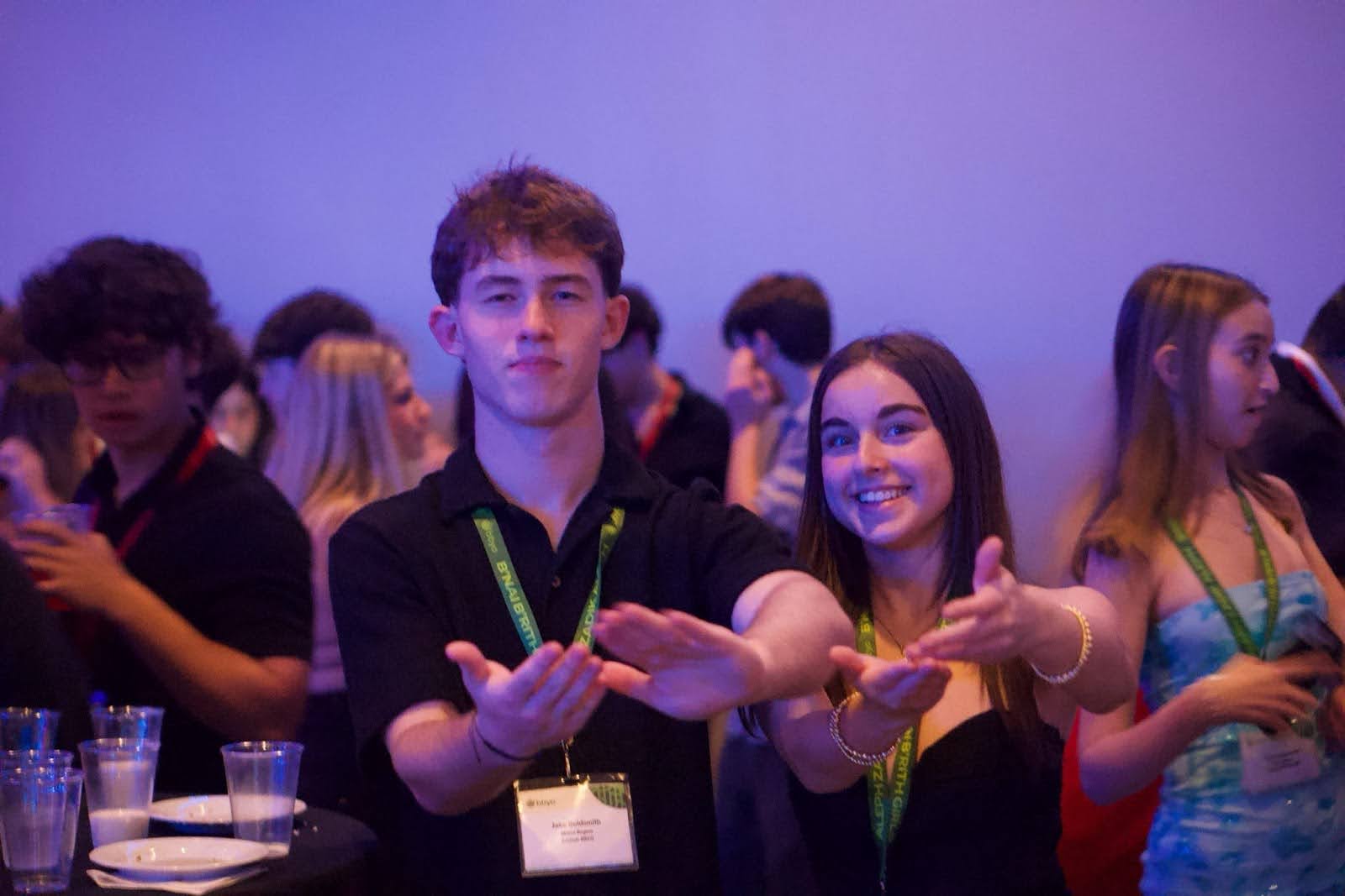 Group of people celebrating on stage