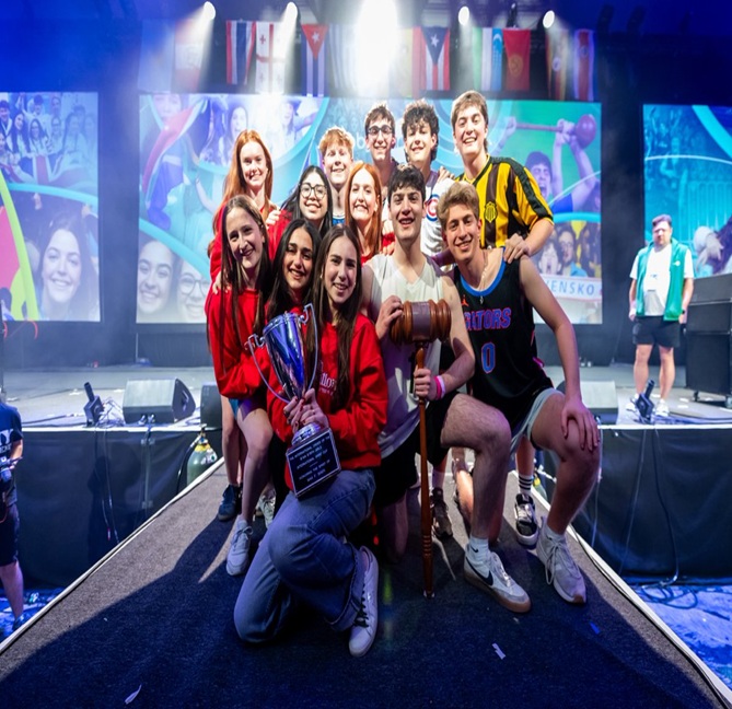 Group of people celebrating on stage