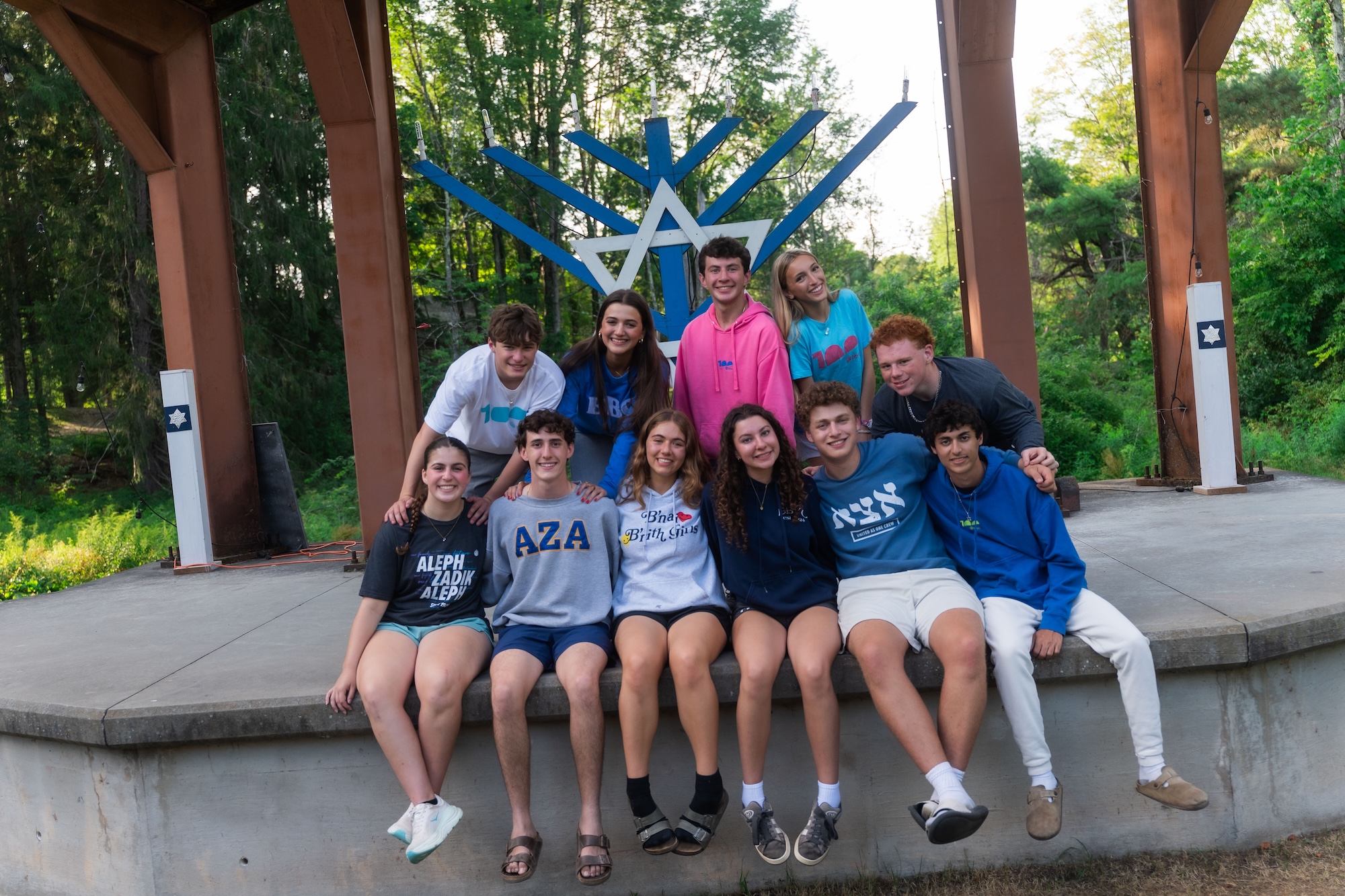 Group of people smiling outdoors