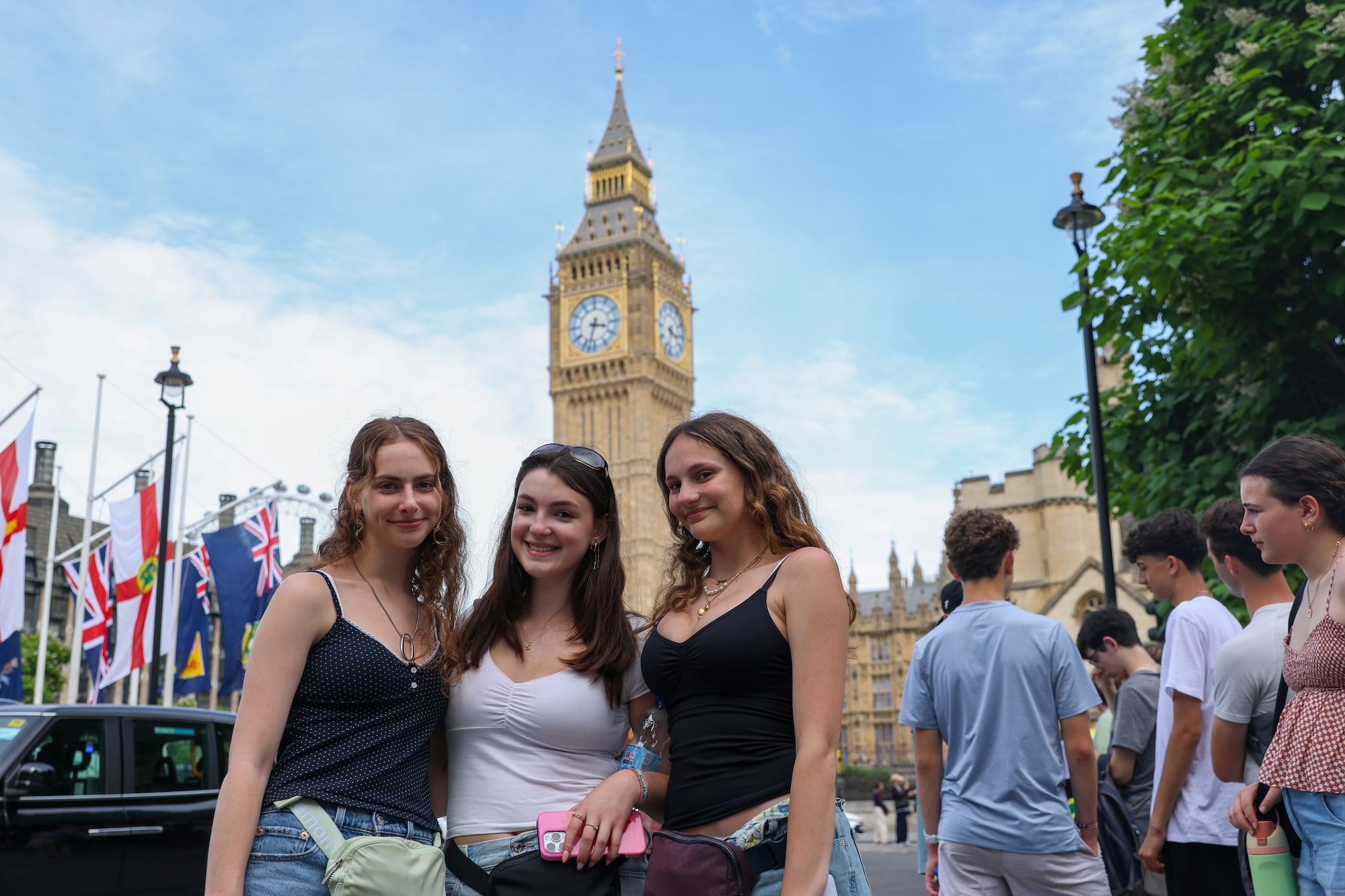 Group of people smiling outdoors