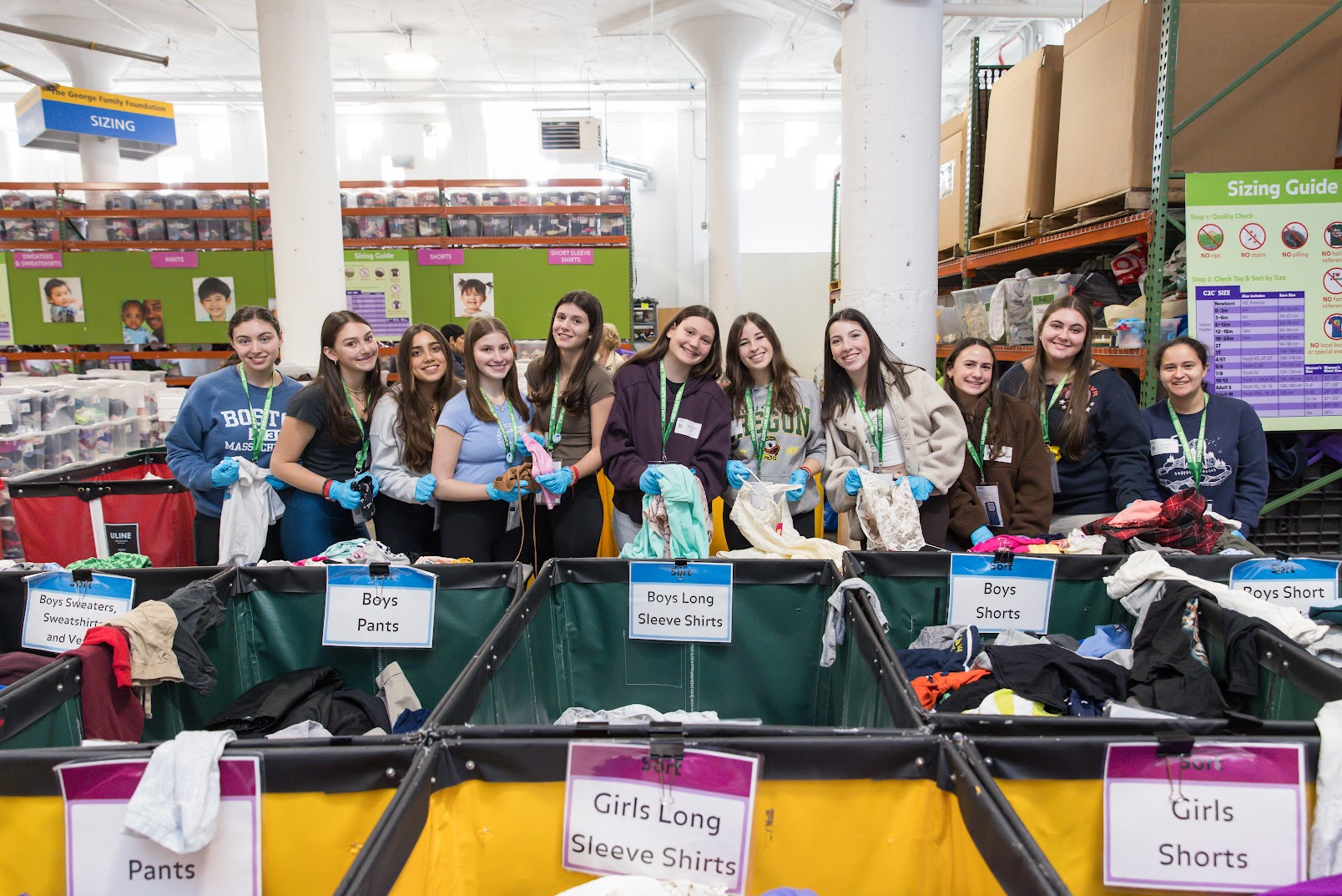 Group of diverse young people smiling at a community event