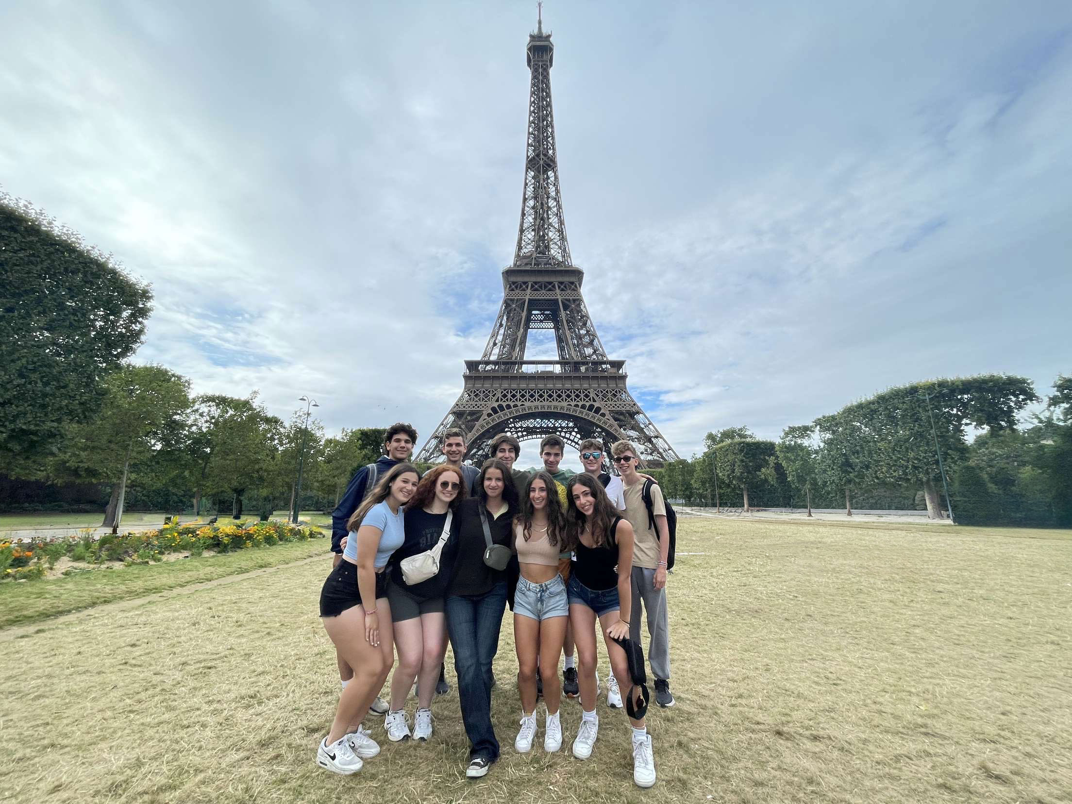 Group of people smiling outdoors