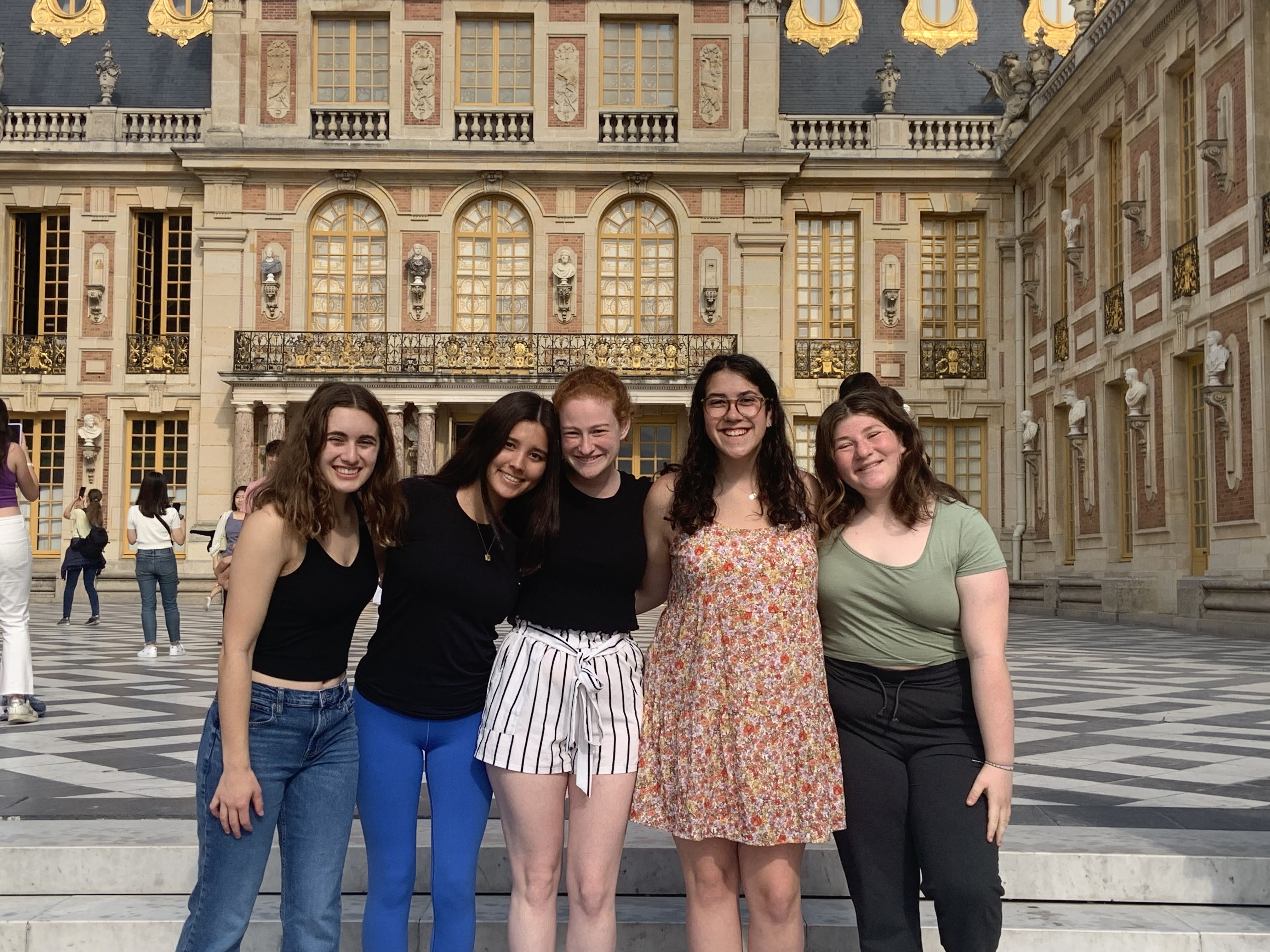 Group of people smiling outdoors