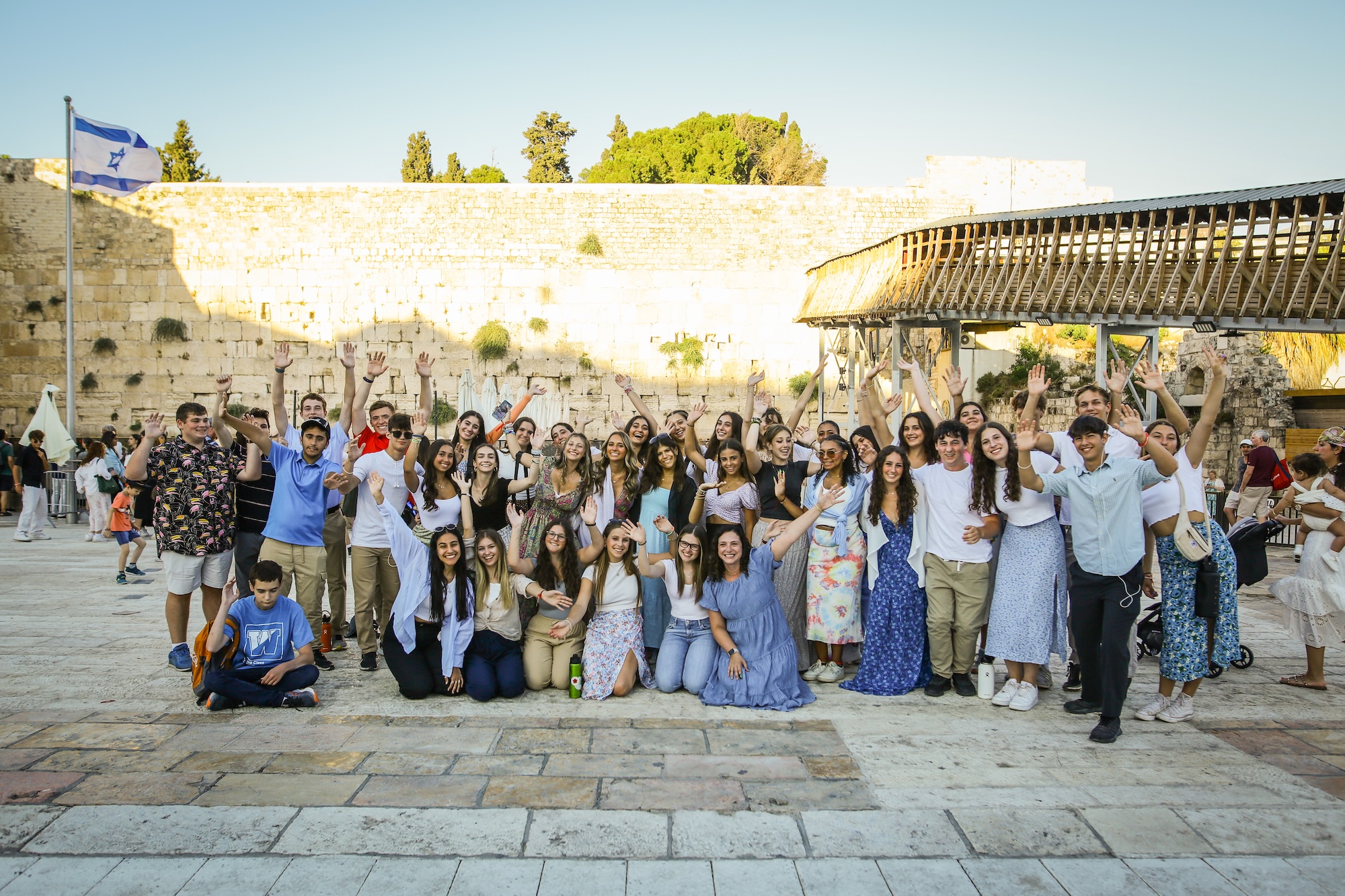 Group of people smiling outdoors